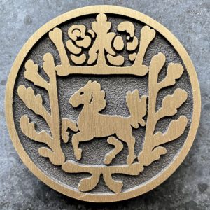 Hautakiveen sukumerkki / Bronze coat of arms for the gravestone